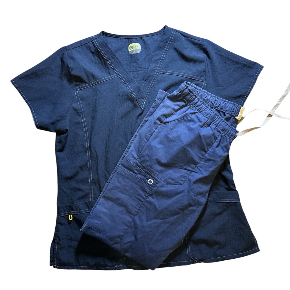 Smart Scrubs navy blue Top and bottoms. Will also have a black pair of bottoms